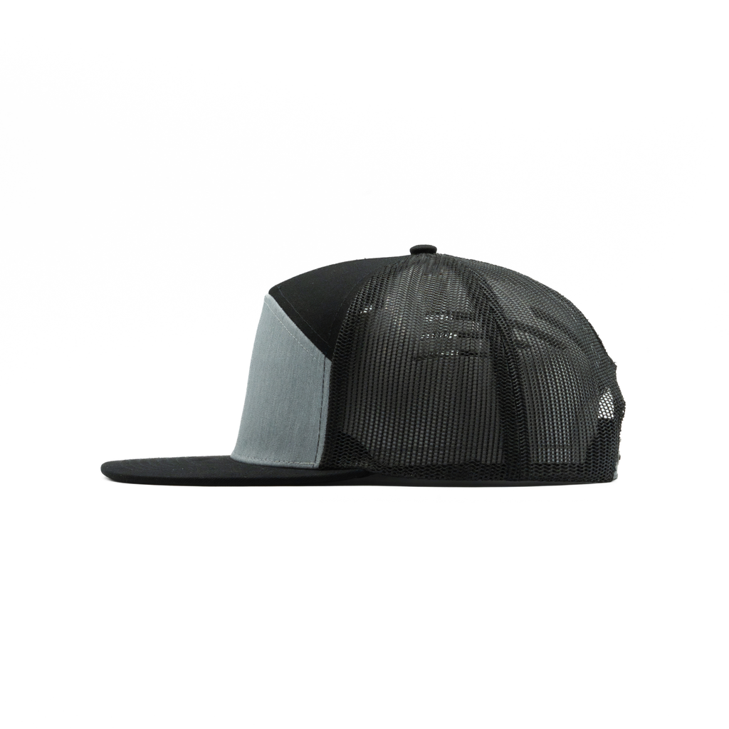635 — 7 Panel Mesh Trucker
