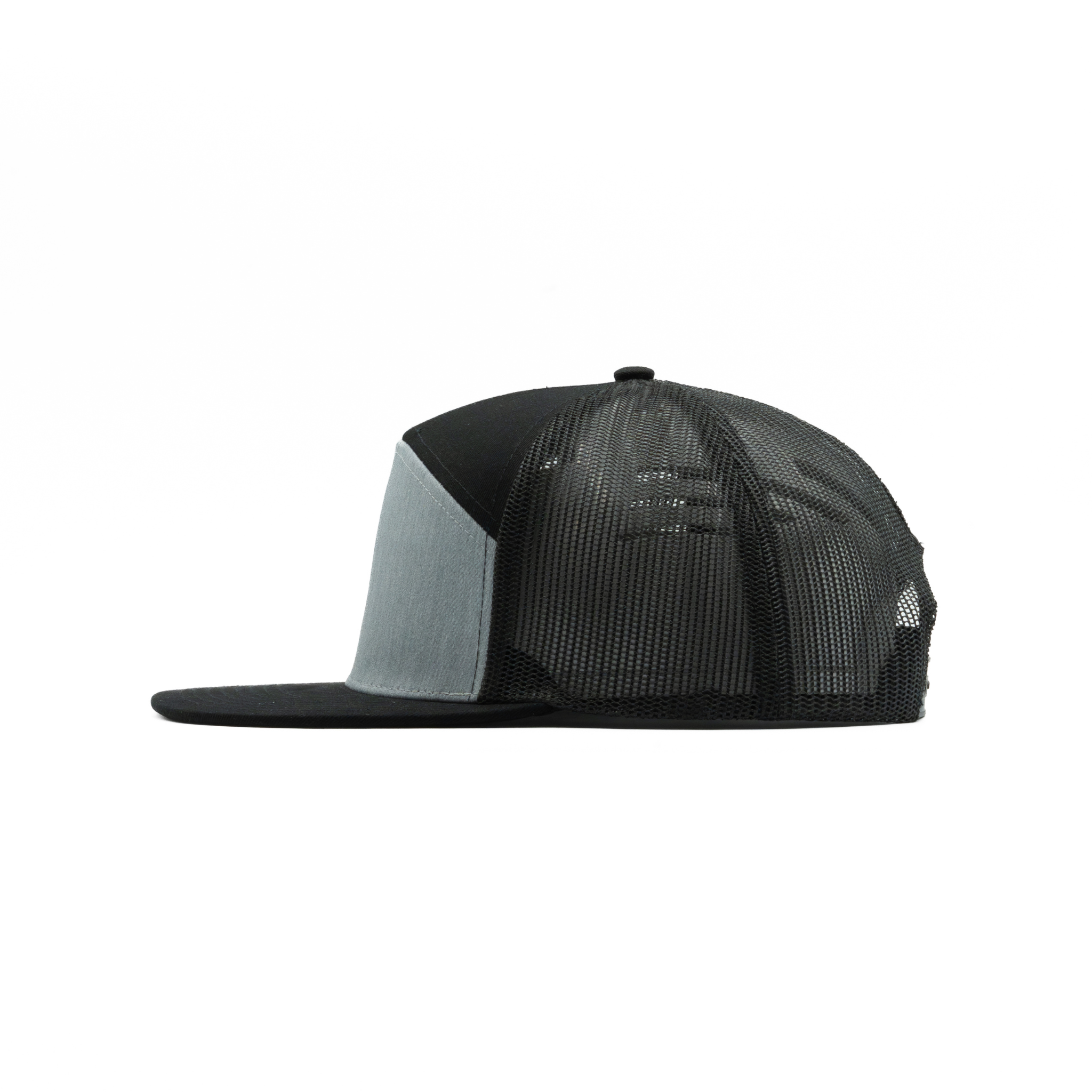 635 — 7 Panel Mesh Trucker