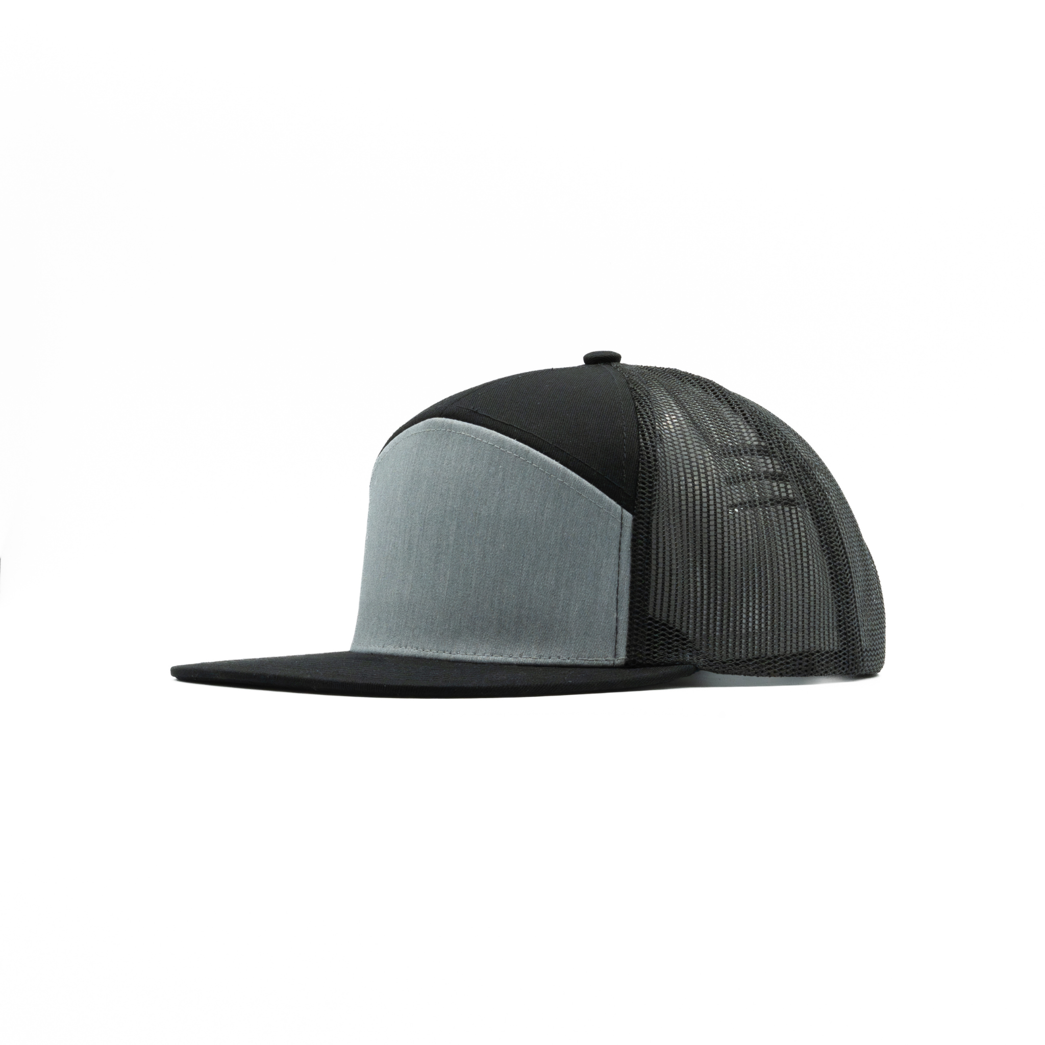 635 — 7 Panel Mesh Trucker
